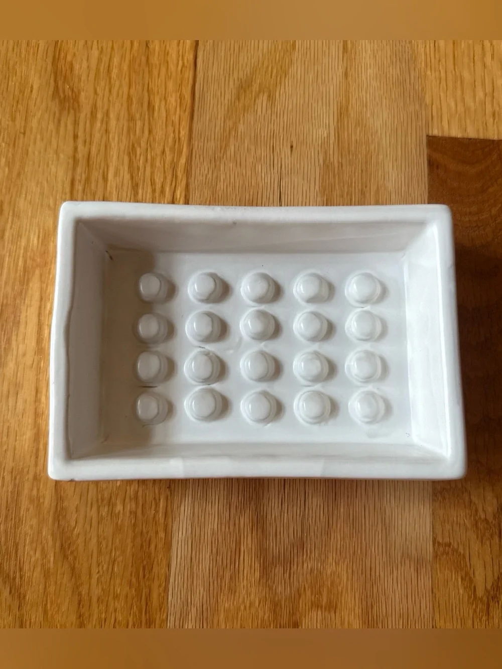 White ceramic pottery barn soap dish